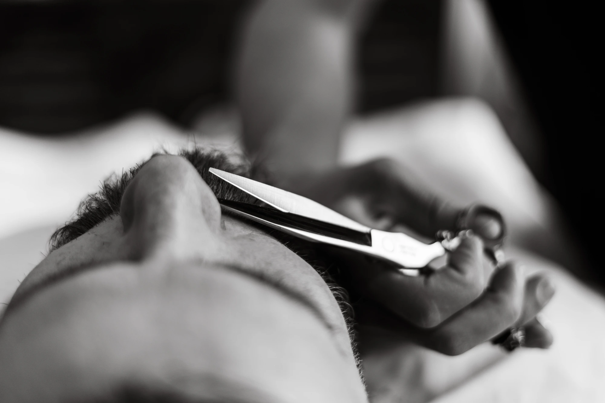 Scissors seen from above on hair