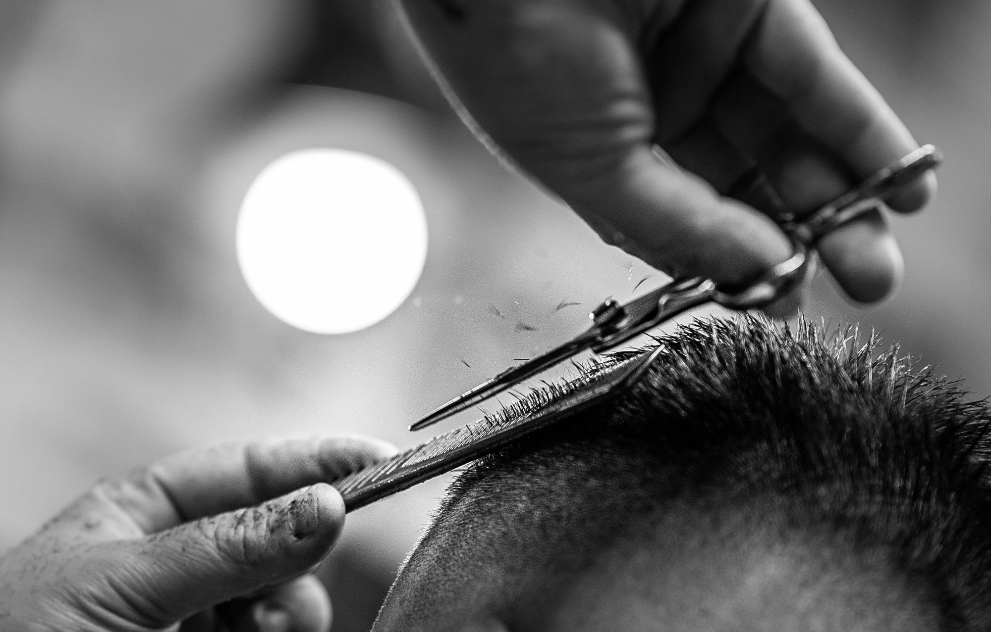 Scissors cutting with bokeh